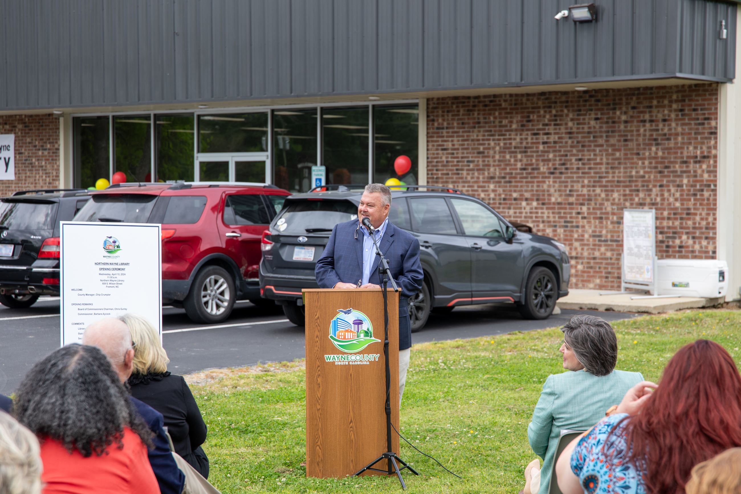 Chairman Chris Gurley speaking at podium