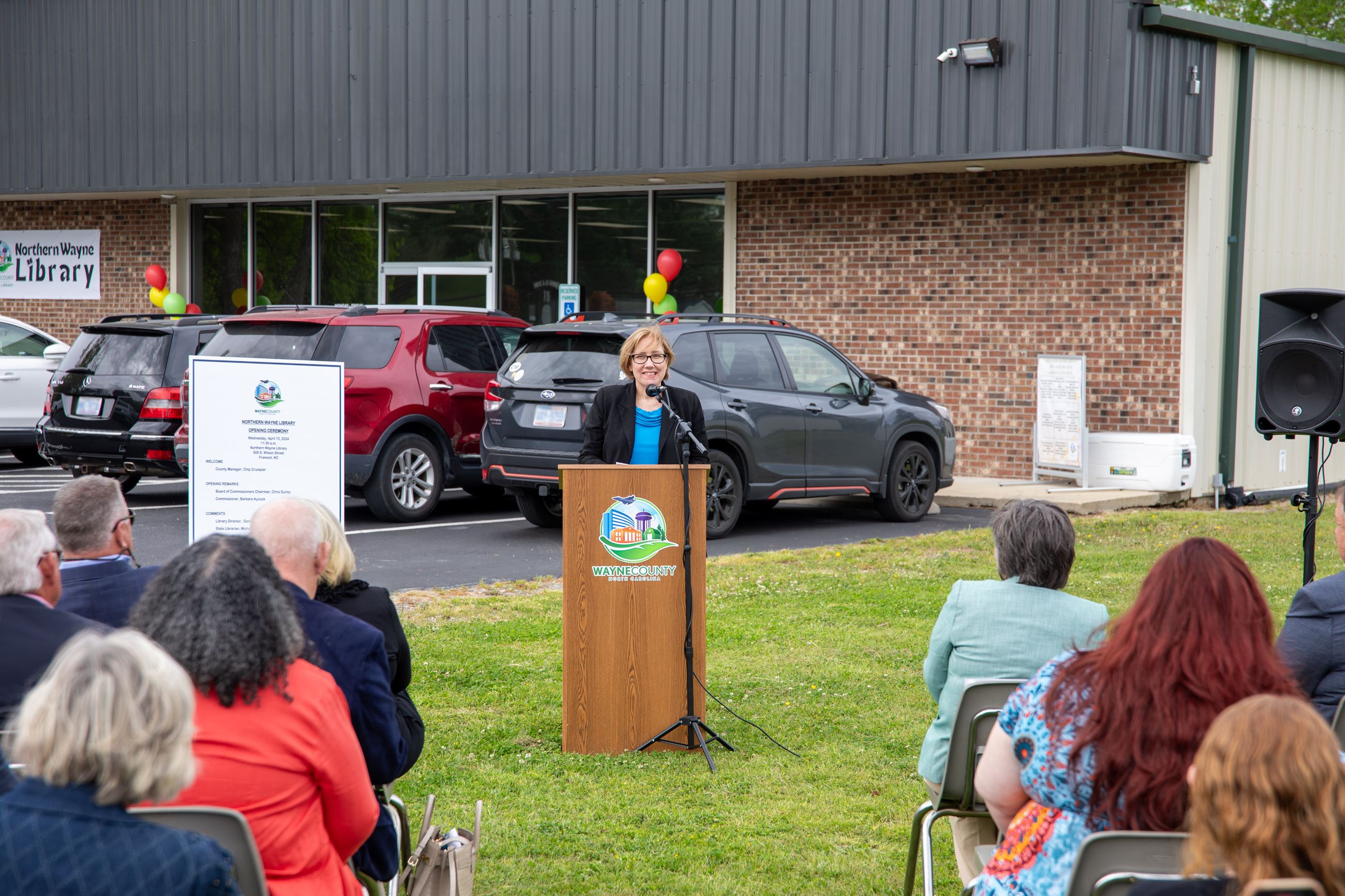 State Librarian Michelle Underhill speaking at podium